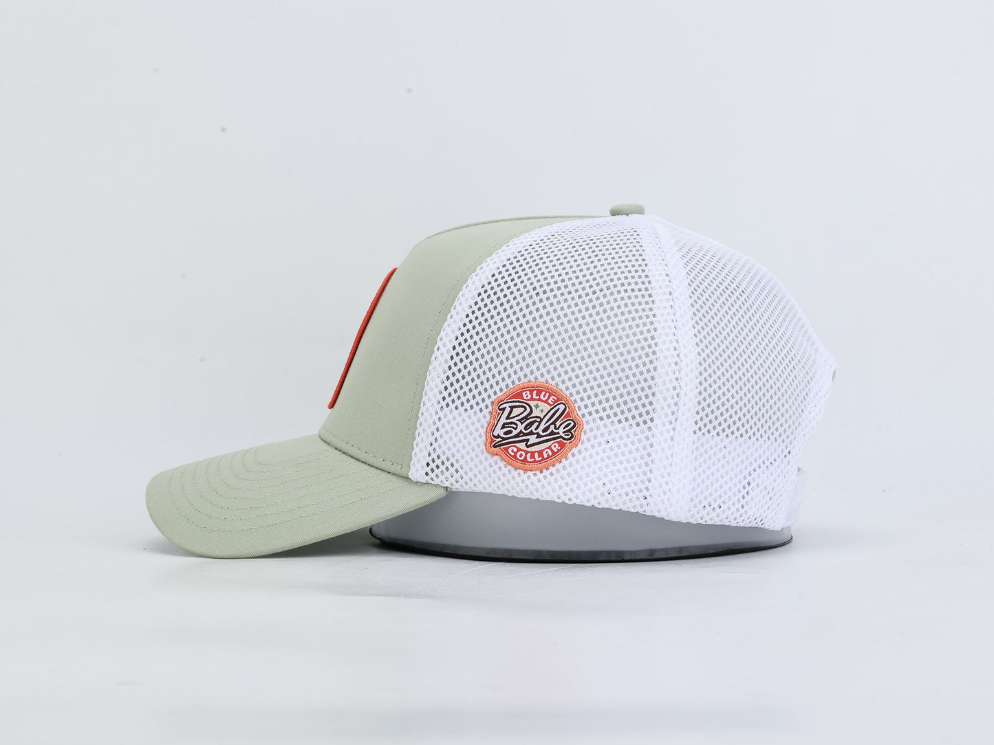 Blue Collar Babe sage green hockey trucker hat side view