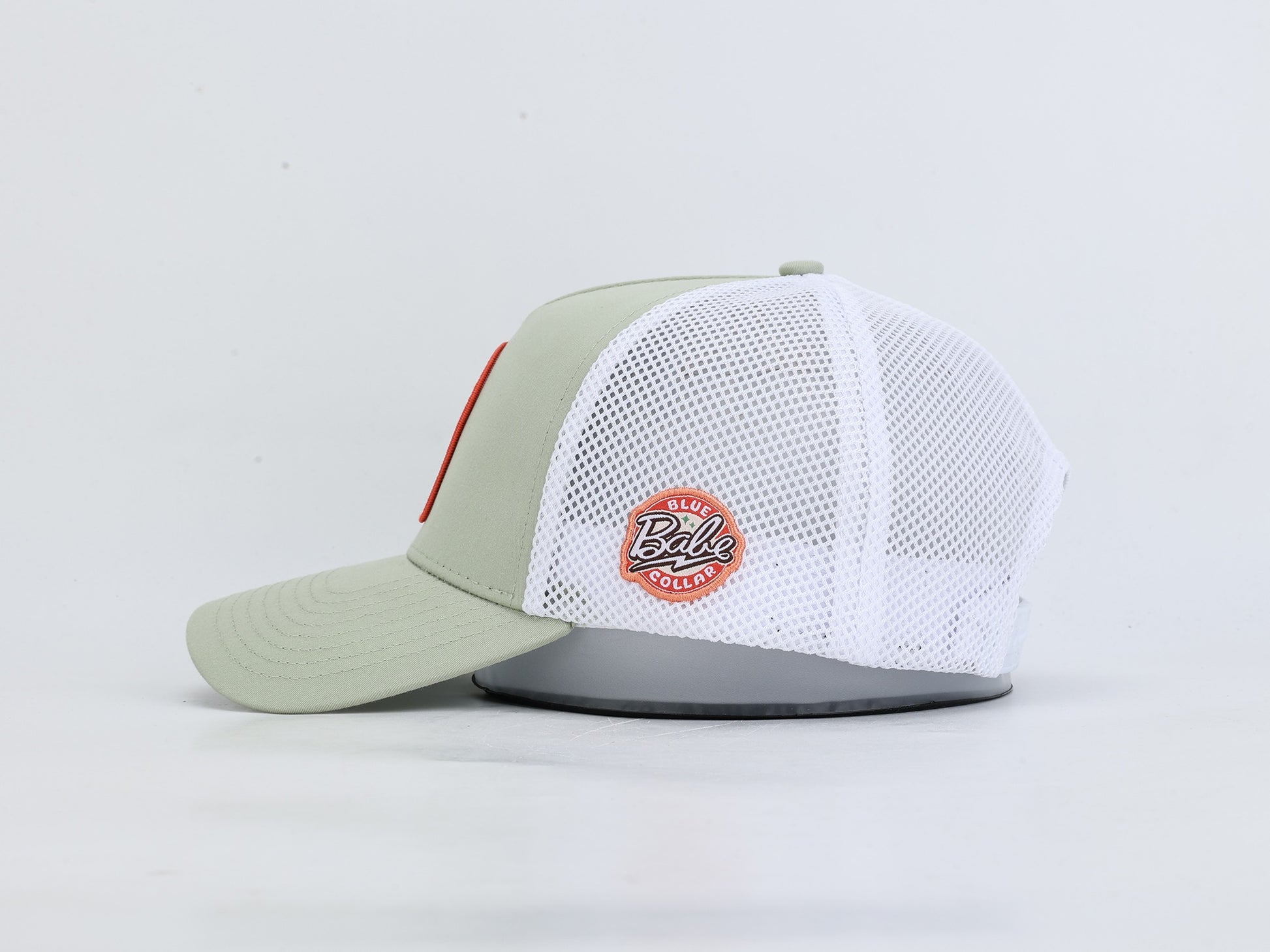 Blue Collar Babe sage green hockey trucker hat side view