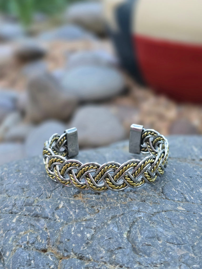 Stainless steel bracelet with gold tone